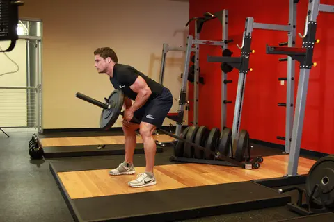 Bent Over One-Arm Long Bar Row — end position