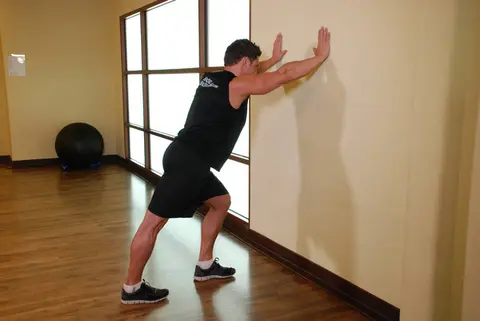 Calf Stretch Hands Against Wall