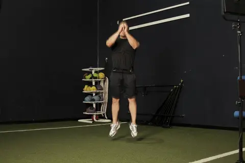 Double Leg Butt Kick — end position
