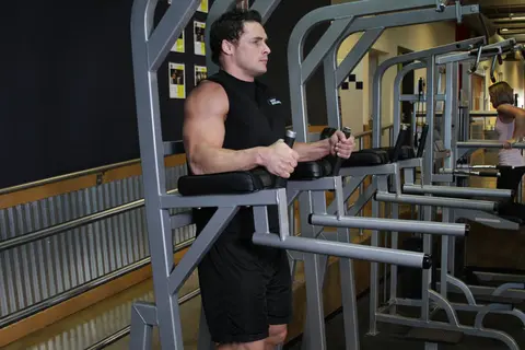 Knee/Hip Raise On Parallel Bars