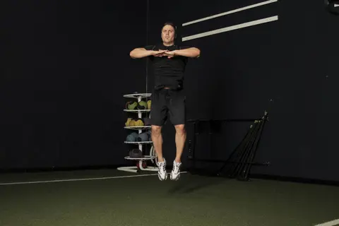Knee Tuck Jump — end position