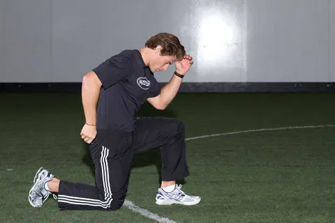 Kneeling Arm Drill — end position