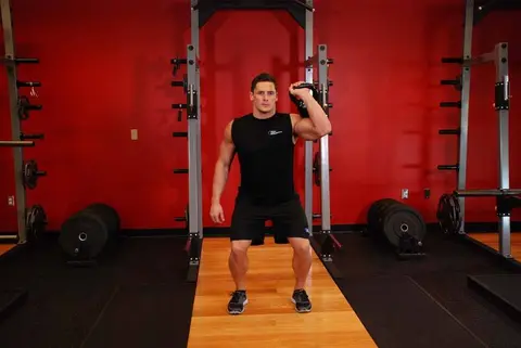 One-Arm Kettlebell Push Press — end position