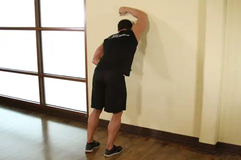 One Arm Against Wall