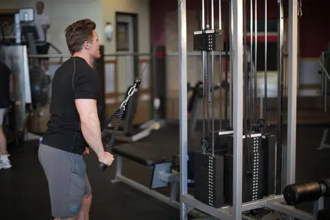 Rope Straight-Arm Pulldown — end position