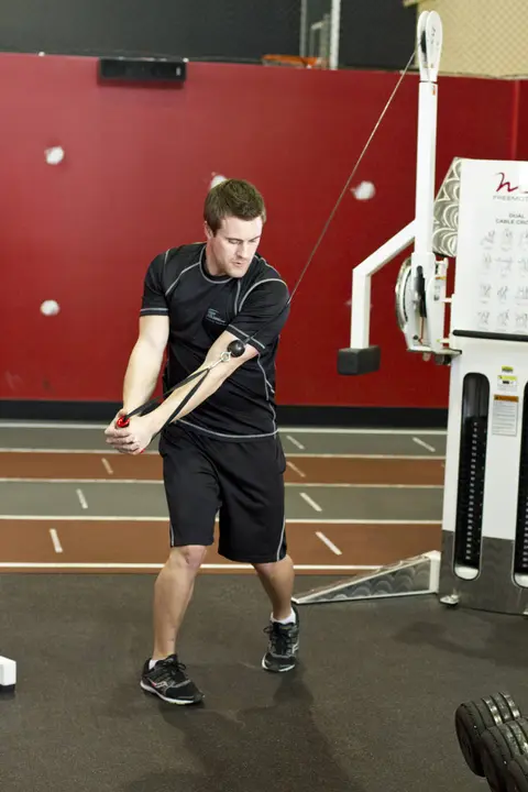 Standing Cable Wood Chop — end position