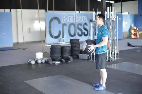 Standing Two-Arm Overhead Throw