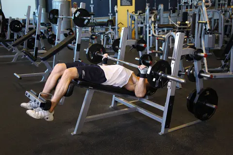 Wide-Grip Decline Barbell Bench Press — end position